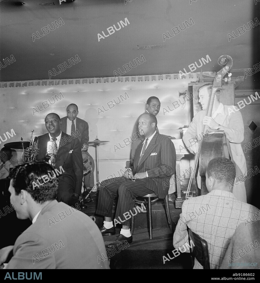 WILLIAM PAUL GOTTLIEB. Portrait of Sidney De Paris, Freddie Moore, Eddie (Emmanuel) Barefield, Sammy Price, and Charlie Traeger, Jimmy Ryan's (Club), New York, N.Y., ca. July 1947.