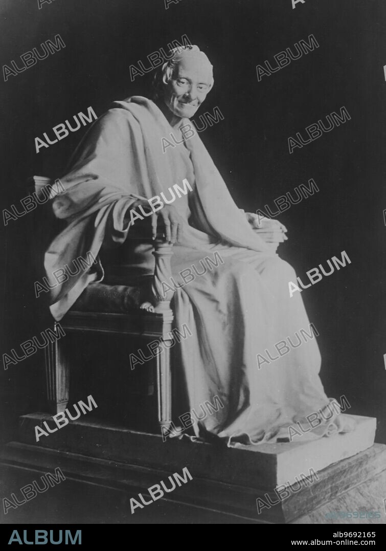 Marble Sculpture - "Voltaire Seated in an Armchair" by French neoclassical sculptor Jean-Antoine Houdon (1741-1828). State Hermitage Museum, St Petersburg. 1781. Supplied By: SCRSS - Society for Co-operation in Russian & Soviet Studies.