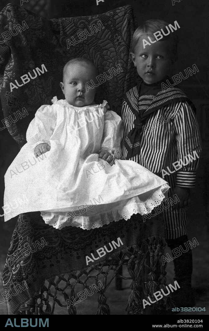 Ernest Orlando Lawrence, three years old with brother, John Lawrence, six months old. Ernest Orlando Lawrence (August 8, 1901 - August 27, 1958) was an American physicist and Nobel Laureate, known for his invention, utilization, and improvement of the cyclotron atom-smasher beginning in 1929, based on his studies of the works of Rolf Wideroe, and his later work in uranium-isotope separation for the Manhattan Project. Lawrence had a long career at the University of California, Berkeley, where he became a Professor of Physics. In 1939, Lawrence was awarded the Nobel Prize in Physics for his work in inventing the cyclotron and developing its applications. After the war, Lawrence campaigned extensively for government sponsorship of large scientific programs. Lawrence was a forceful advocate of "Big Science" with its requirements for big machines and big money. He'd died in 1958 at the age of 57. After his death, the Regents of the University of California voted to rename two of the university's nuclear research sites after Lawrence: the Lawrence Livermore and Lawrence Berkeley Laboratories. Chemical element number 103, discovered at LBNL in 1961, is named "lawrencium" in his honor.