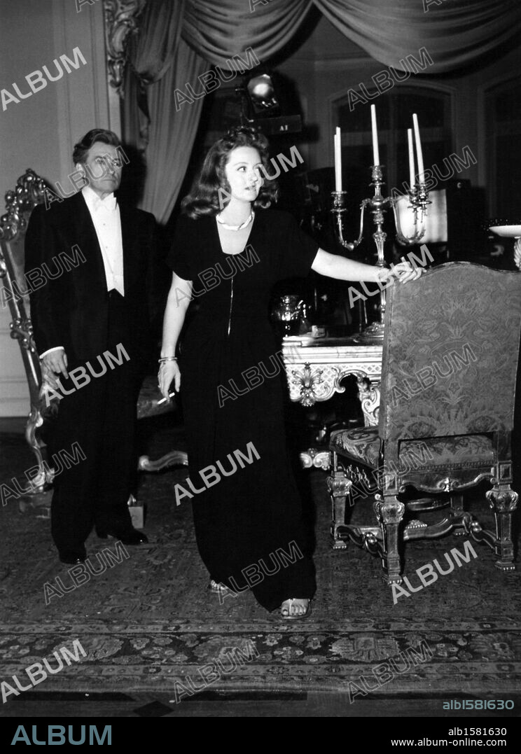 BETTE DAVIS and CLAUDE RAINS in DECEPTION, 1946, directed by IRVING RAPPER. Copyright WARNER BROTHERS.
