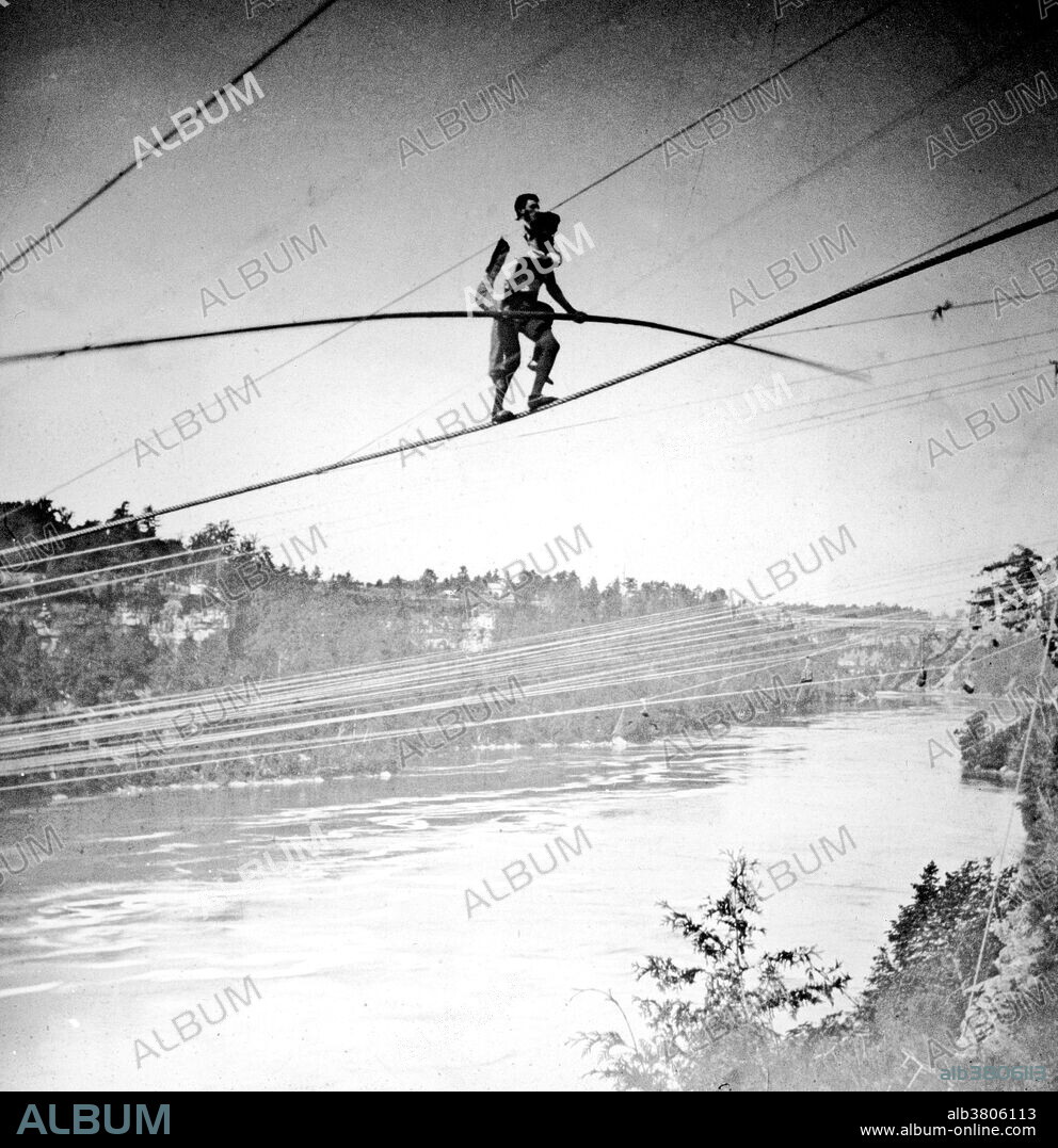 Entitled: "Blondin carries manager Harry Colcord on back over Niagara Falls." Charles Blondin (born Jean FranÃ§ois Gravelet, February 28, 1824 - February 22, 1897) was a French tightrope walker and acrobat, called the "Chevalier Blondin", or simply "The Great Blondin". At the age of five he was sent to the Ã‰cole de Gymnase at Lyon and, after six months training as an acrobat, made his first public appearance as "The Boy Wonder". His superior skill and grace, as well as the originality of the settings of his acts, made him a popular favorite. He is most remembered for crossing the Niagara Gorge (located on the Canada- US border) on a tightrope, 1,100 feet long, 3.25 inches in diameter and 160 feet above the water, near the location of the current Rainbow Bridge. He first accomplished this on June 30, 1859, and a number of times thereafter, always with different theatrical variations: blindfolded, in a sack, trundling a wheelbarrow, on stilts, carrying a man (his manager, Harry Colcord) on his back, sitting down midway while he cooked and ate an omelet and standing on a chair with only one chair leg on the rope. Blondin died of diabetes in 1897, at the age of 73.