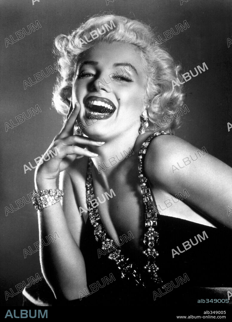 NORMA JEAN BAKER. MARILYN MONROE in HOW TO MARRY A MILLIONAIRE, 1953, directed by JEAN NEGULESCO. Copyright 20TH CENTURY FOX.