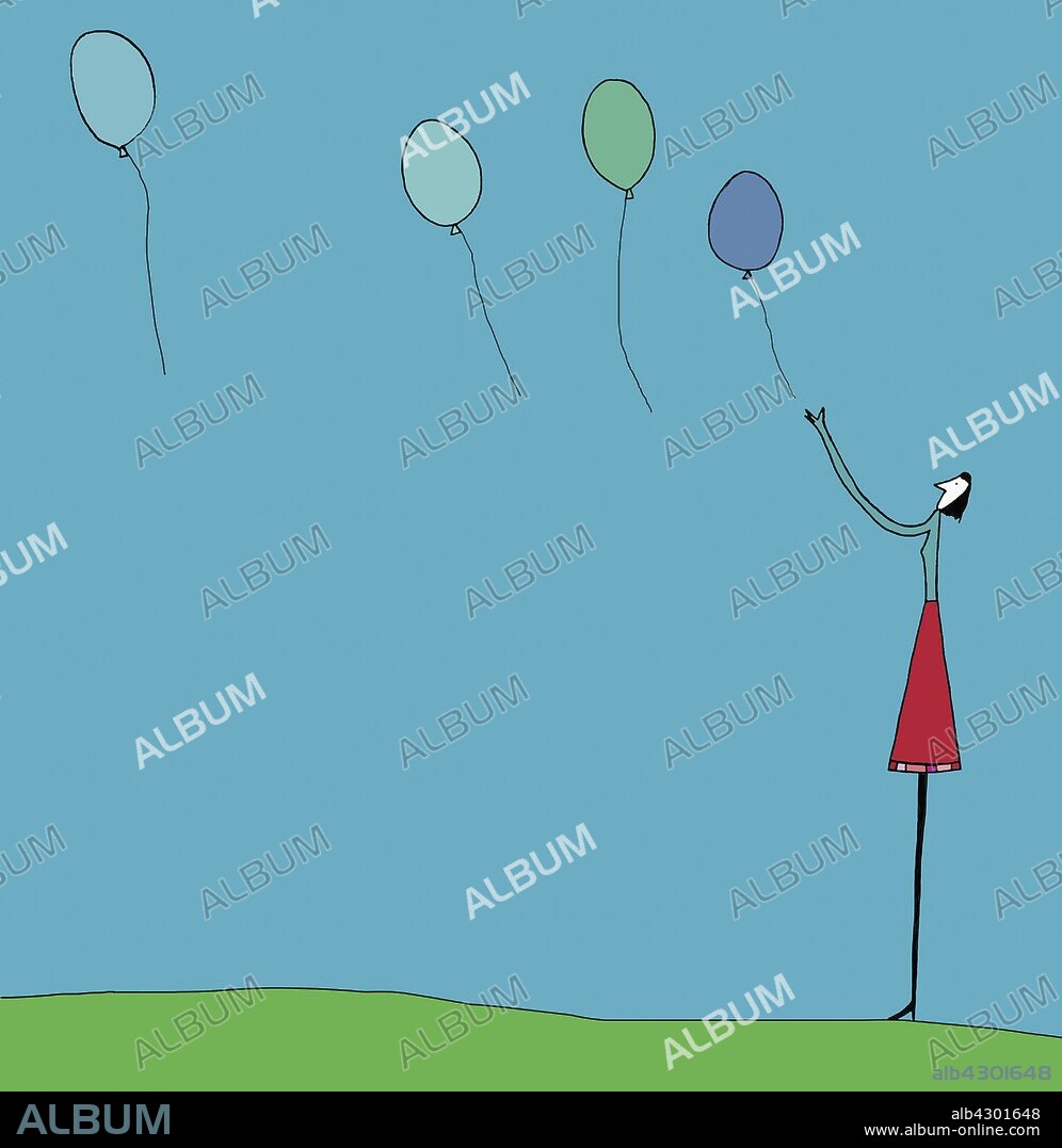 Woman releasing balloons.