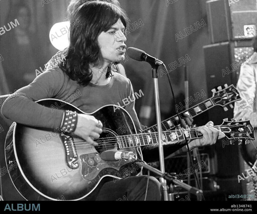 Dec 11, 1968 - London, England, UK - Rolling Stones frontman MICK JAGGER pictured recording 'The Rolling Stones Rock and Roll Circus'. Little did the Rolling Stones know how apt their name - inspired by the title of a Muddy Waters song, 'Rollin' Stone' - would turn out to be. Formed in 1962, they are the longest-lived continuously active group in rock and roll history. Throughout four decades of shifting tastes in the arena of popular music, the Stones have kept rolling, adapting to the latest sounds and styles without straying too far from their origins as a blues-loving, guitar-based rock and roll band. (Credit Image: © Keystone/Keystone Pictures/ZUMA Press) RESTRICTIONS: * Germany Rights OUT *. 11/12/1968