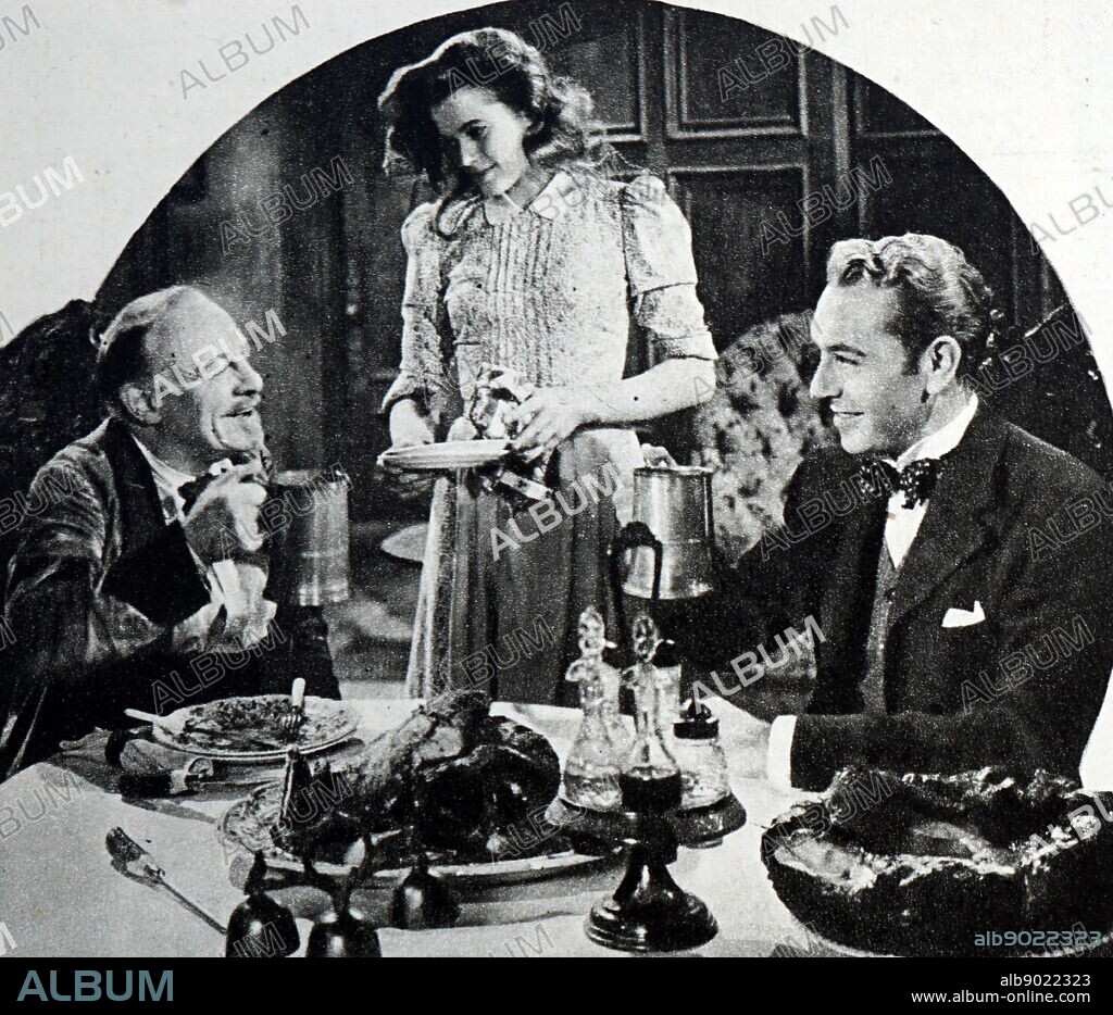 Film still of Edmund Gwenn (1877-1959), Janis Paige (1922-) and Paul Henreid (1908-1992) from 'Of Human Bondage'.