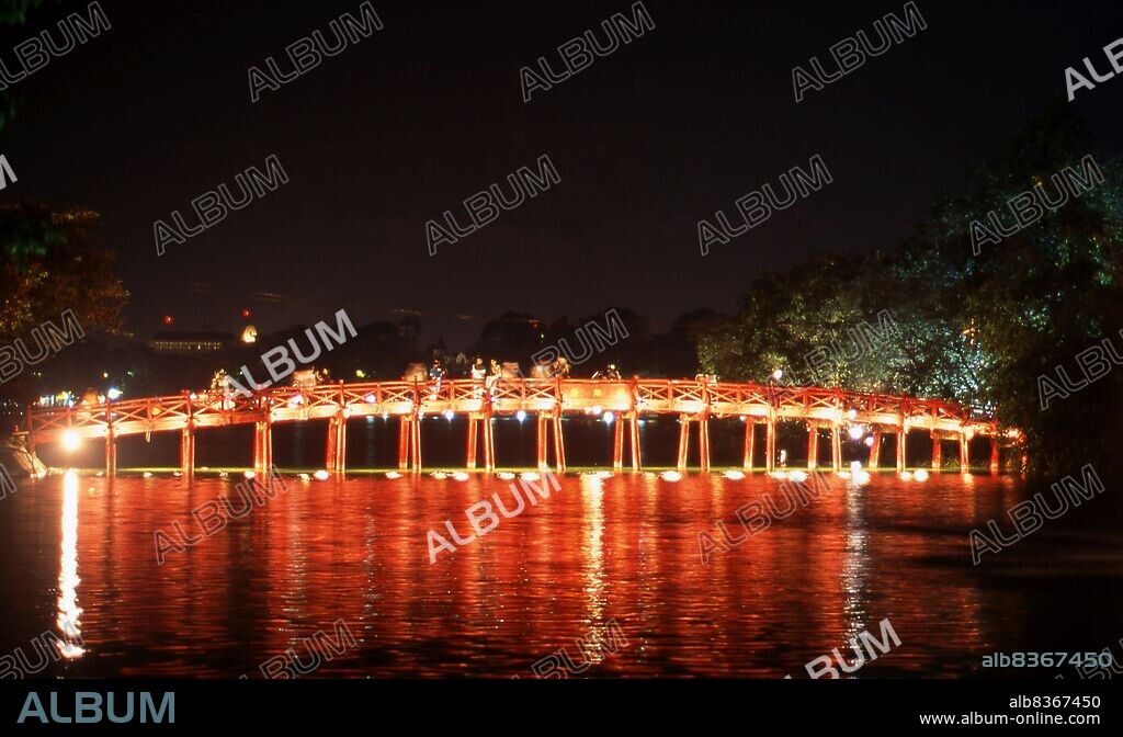 Ho Hoan Kiem means Lake of the Restored Sword, a body of water that lies at the heart of Hanoi. Until the 15th century it was called Luc Thuy or Green Water. Legend has it that during the Ming occupation (1407-28), General Le Loi was presented with a magical sword by a divine turtle that lived in the waters. With the help of this sword, Le Loi expelled the Chinese from northern Vietnam and established himself as Emperor Le Thai To. Later, when the emperor was sailing on the lake, the turtle rose to the surface and reclaimed the sword. Ever since it has been known as Ho Hoan Kiem.